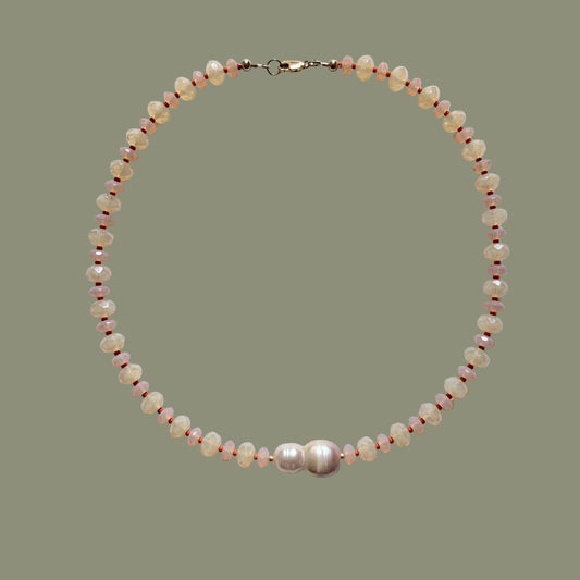 Pearl necklace on a white background
