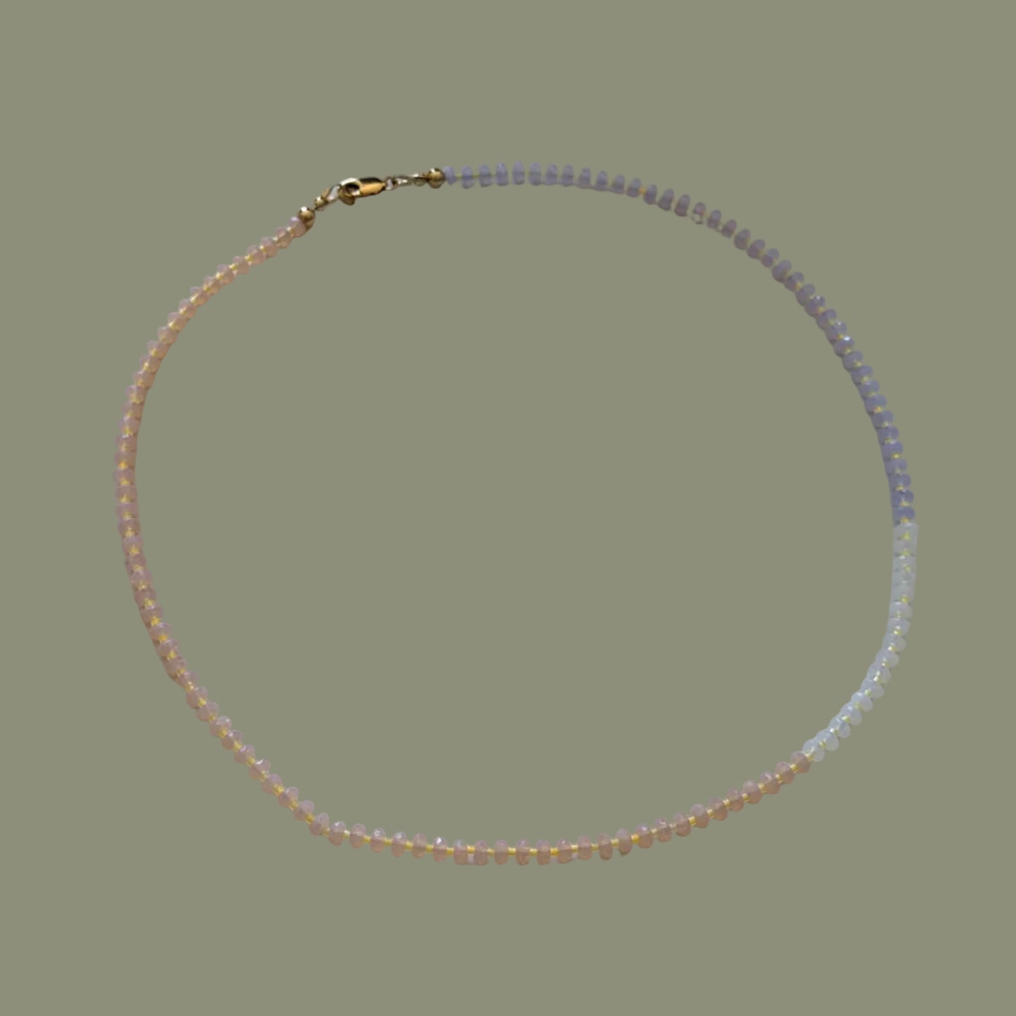 Beaded necklace on a white surface