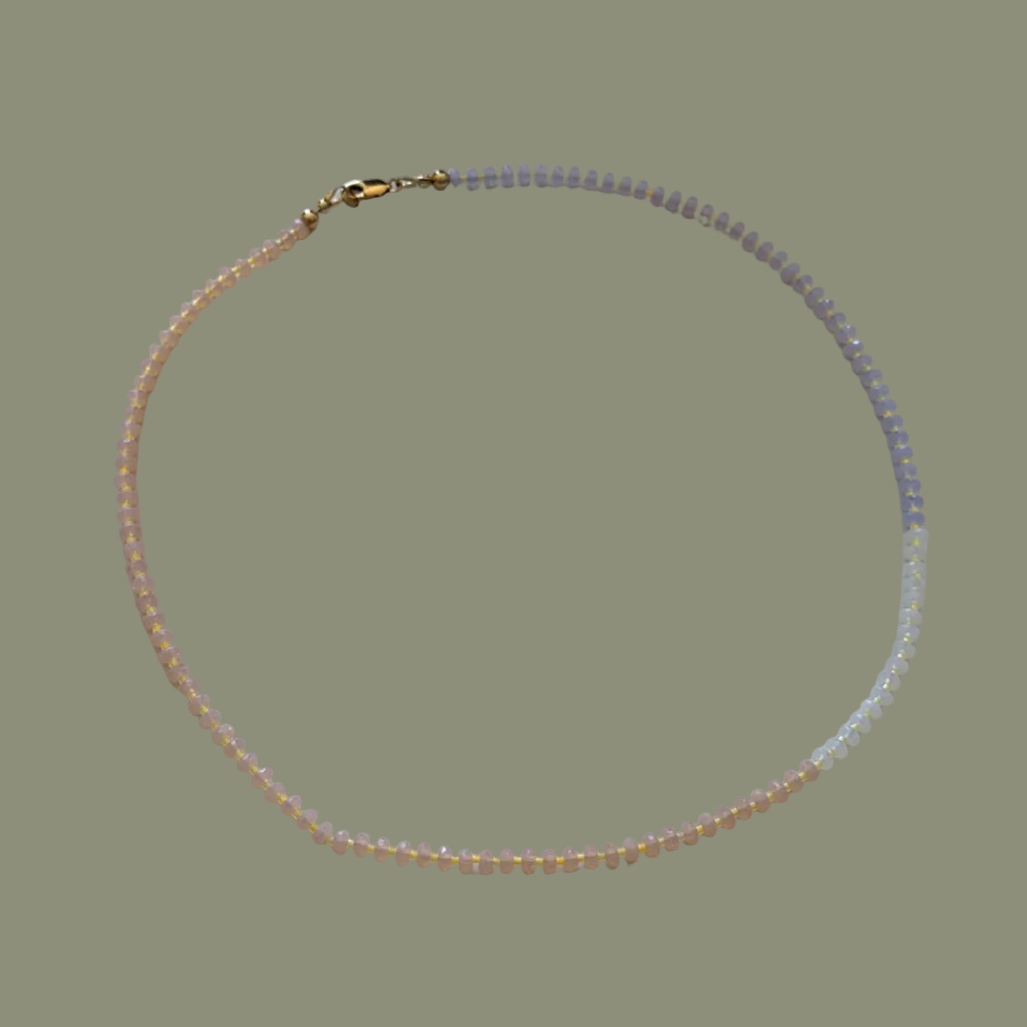 Beaded necklace on a white surface