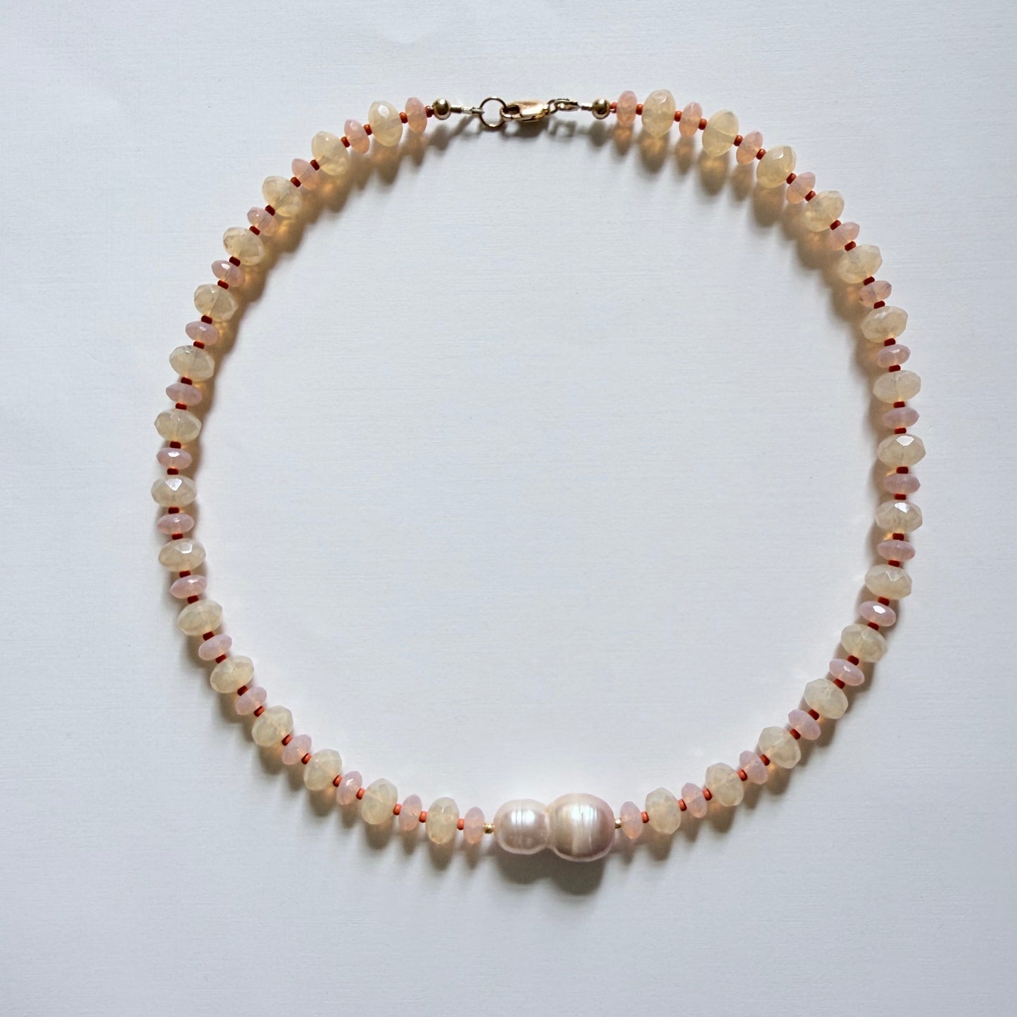 Pearl necklace on a white background