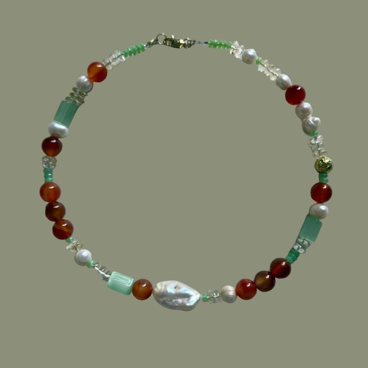 Beaded bracelet with multicolored beads on a light gray background